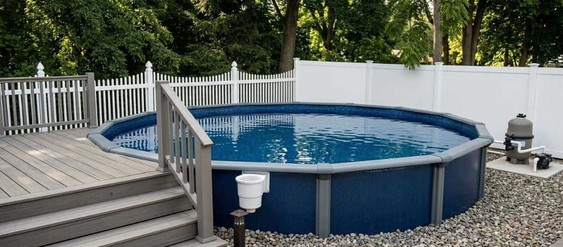 shot of a round above-ground pool with a dark blue liner and gray trim