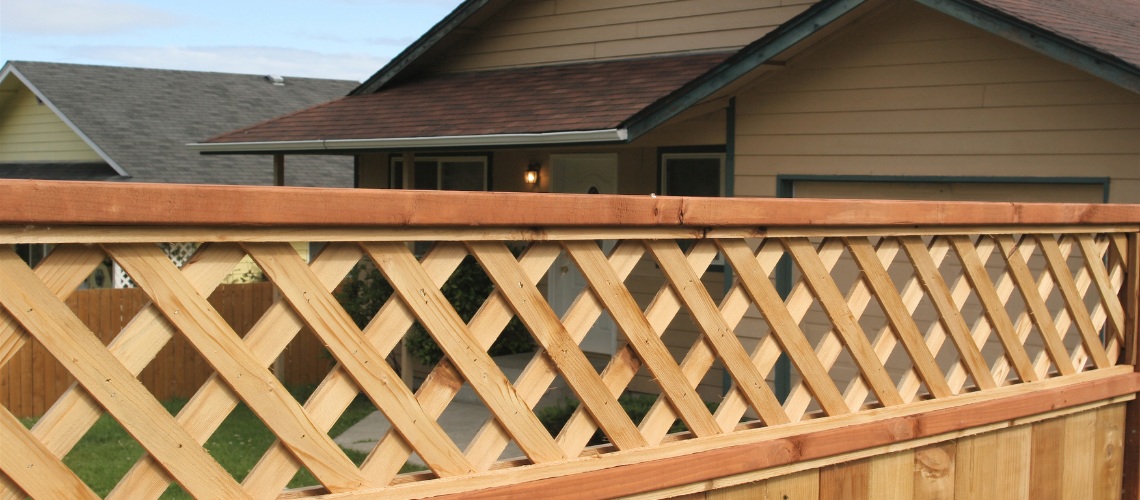 view of a wooden fence topper